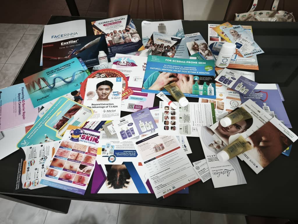 Dermatology literature and product samples collected by the Dr Orizi team at PDM ADC 2026