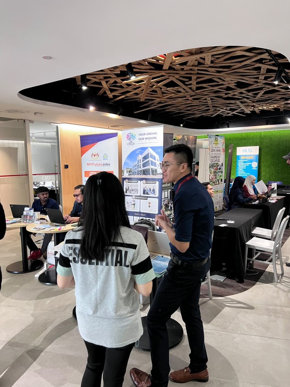 ORIZI Group booth at QIU Industry Day 2026 with Your Dream Our Mission standee