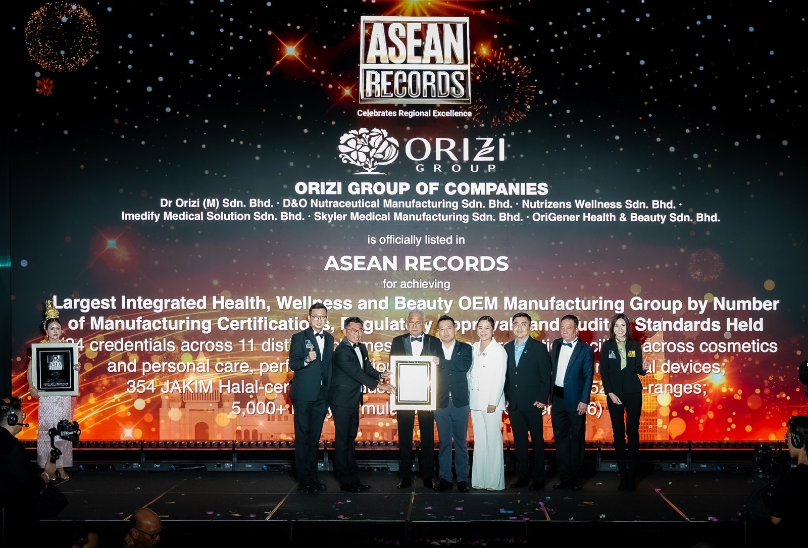 ORIZI Group on stage as the ASEAN Records certificate is presented, 20 October 2026.